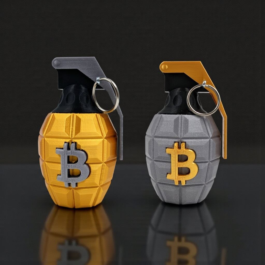 Two 3D-printed Bitcoin Grenades in gold and silver